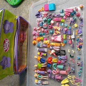 Polly pocket case dolls and clothes lot